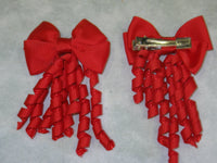 Plain Coloured Bow with curly ribbon