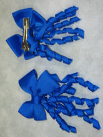 Plain Coloured Bow with curly ribbon