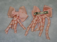 Plain Coloured Bow with curly ribbon