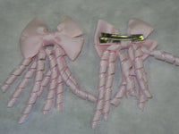 Plain Coloured Bow with curly ribbon