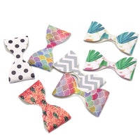 Unfinished Pre Made Leatherette Bows (25)