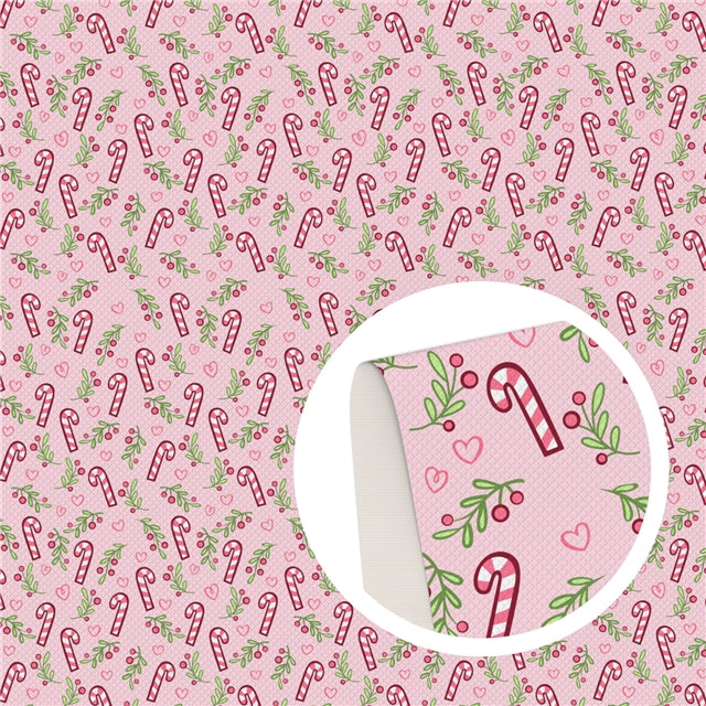 Christmas Candy Canes on Pink Faux Leather Sheet