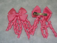 Plain Coloured Bow with curly ribbon
