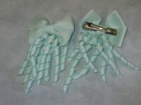 Plain Coloured Bow with curly ribbon
