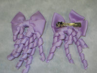 Plain Coloured Bow with curly ribbon
