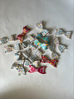 Clearance #43- Leather Patterned Bows x 17
