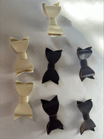 Clearance #54- Brown and White Leather Bows x 7
